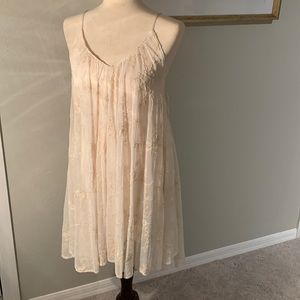 Cream colored laced flower pattern dress